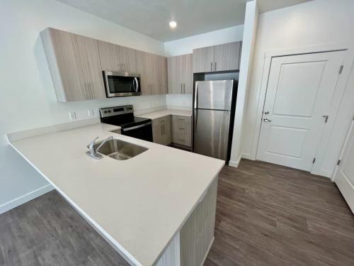 One Bedroom Apartments in Ogden, UT - Apartment Kitchen with Breakfast Bar 