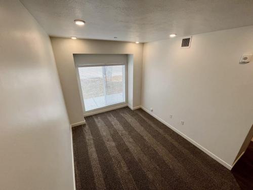 One Bedroom Apartments in Ogden, UT - Living Room with Oversized Window 