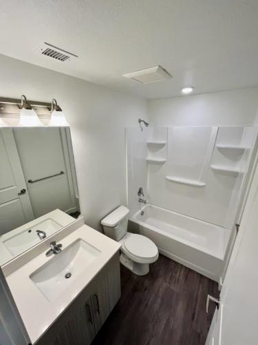 Studio Apartments in Ogden, UT - Bathroom and Tub with Shelving 