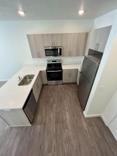 Two Bedroom Apartments in Ogden, UT - Apartment Kitchen with Stainless-Steel Appliances